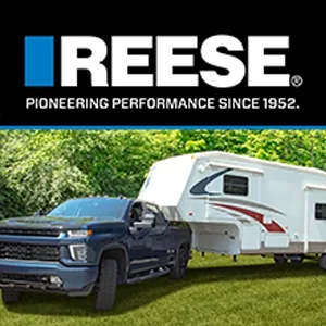 Ford F-150 Pickup Truck Towing a 5th Wheel Trailer with a REESE M5 Fifth Wheel Hitch