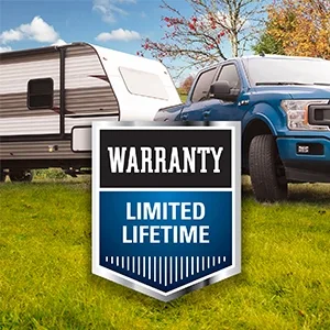 Ford F-150 Pickup Truck Parked with RV Travel Trailer Being Towed by a REESE Trailer Hitch